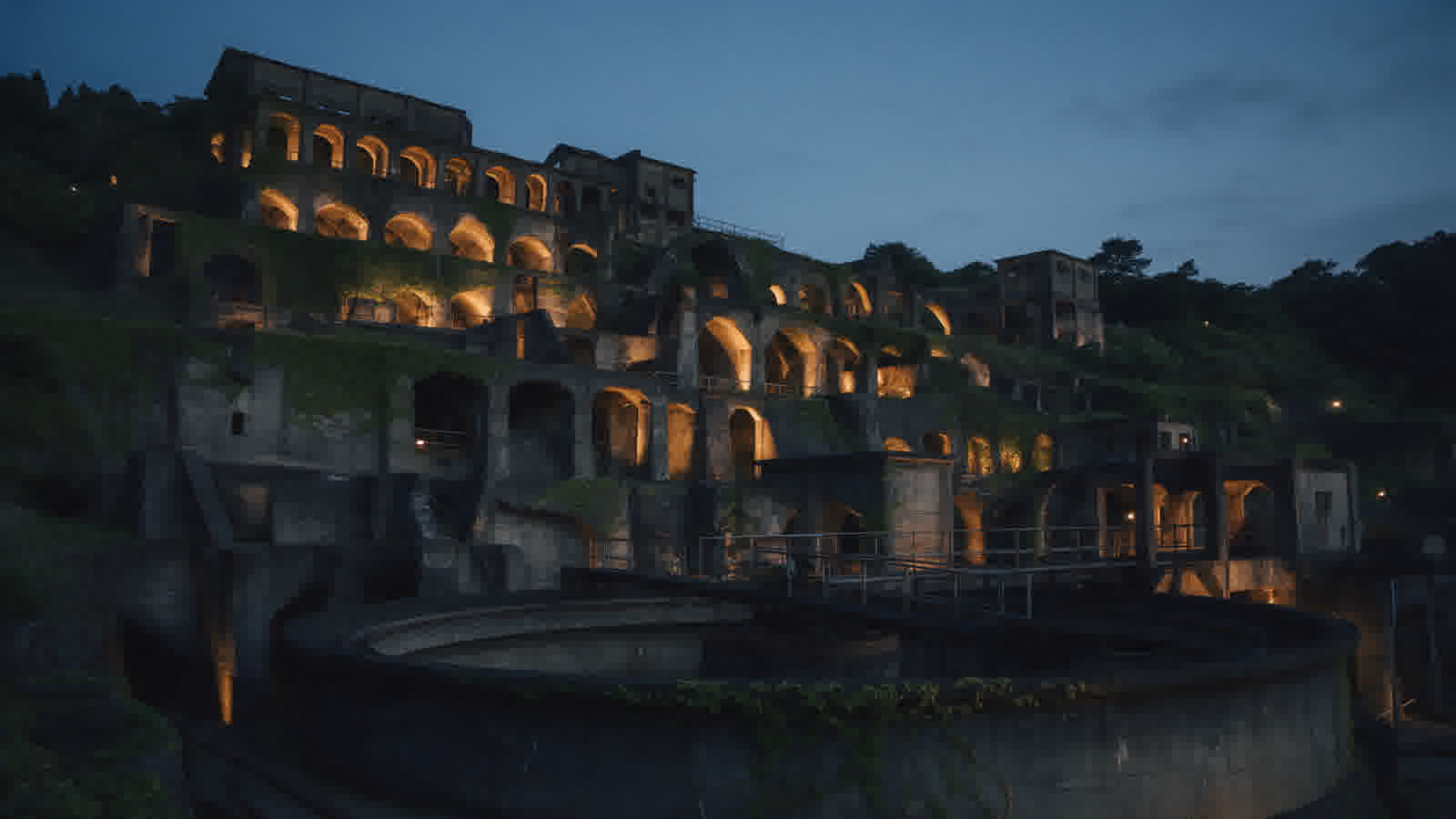 Kitazawa flotation plant ruins at blue hour, lights coming on